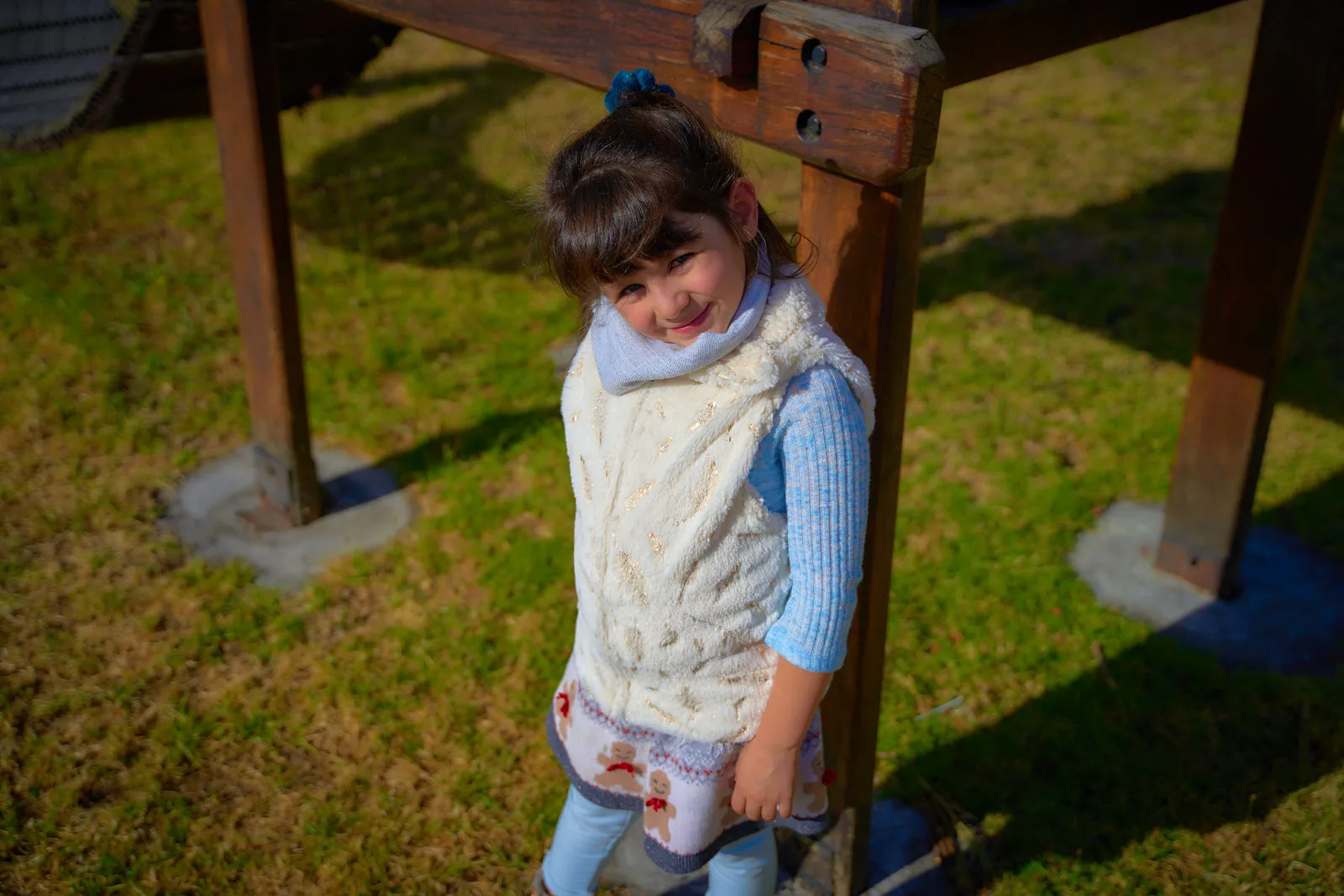Girl wearing a knit winter vest