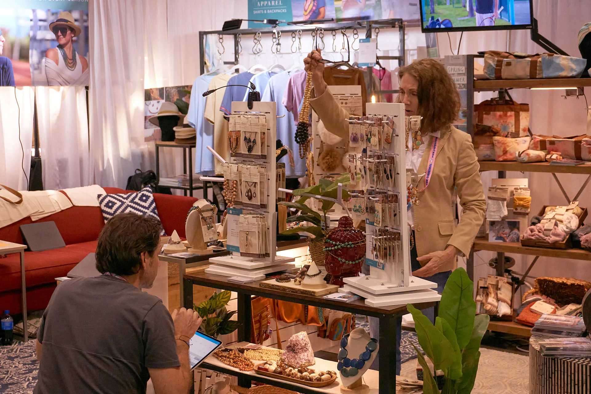 Terra Natural Designs booth with handmade jewelry, bags and apparel