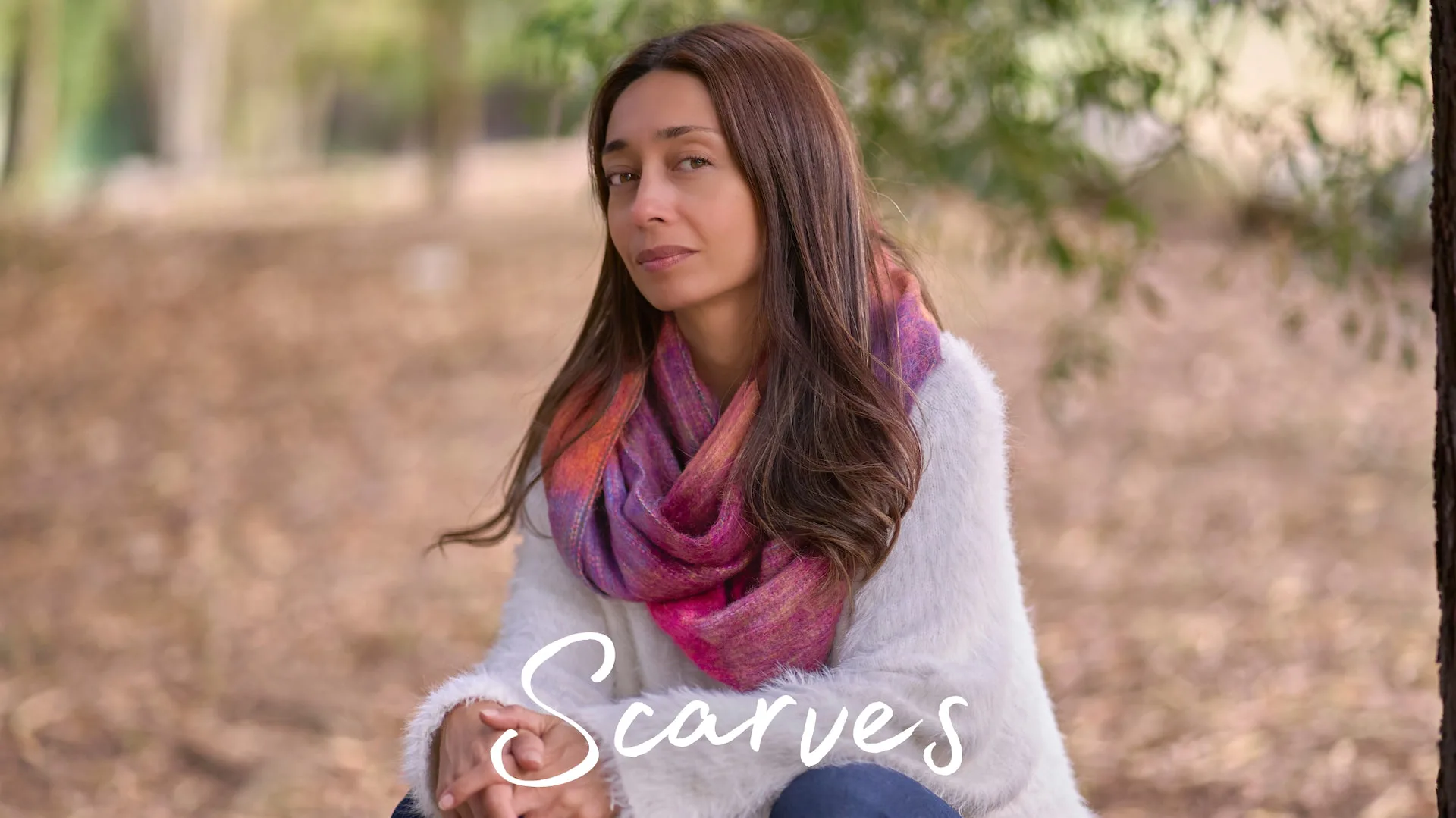 Scarves: woman wearing a striped infinity scarf